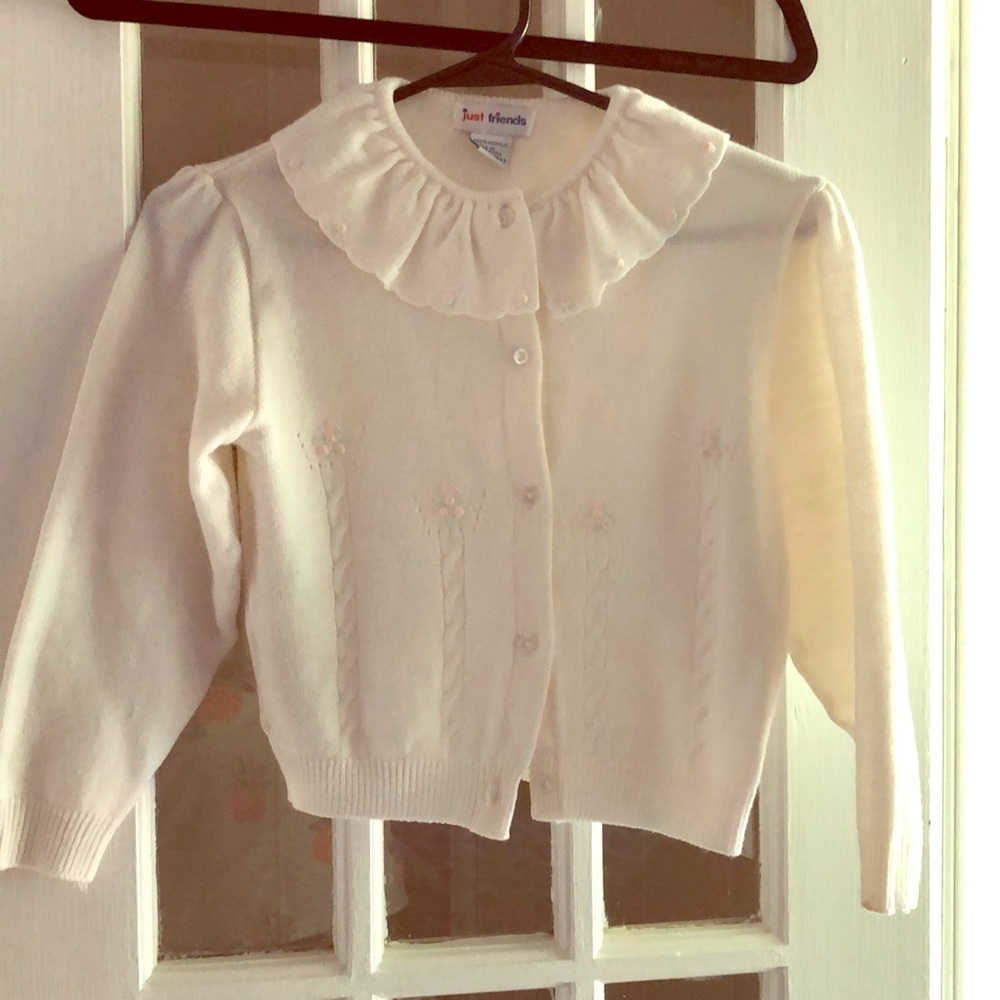 Girls off-white cardigan.